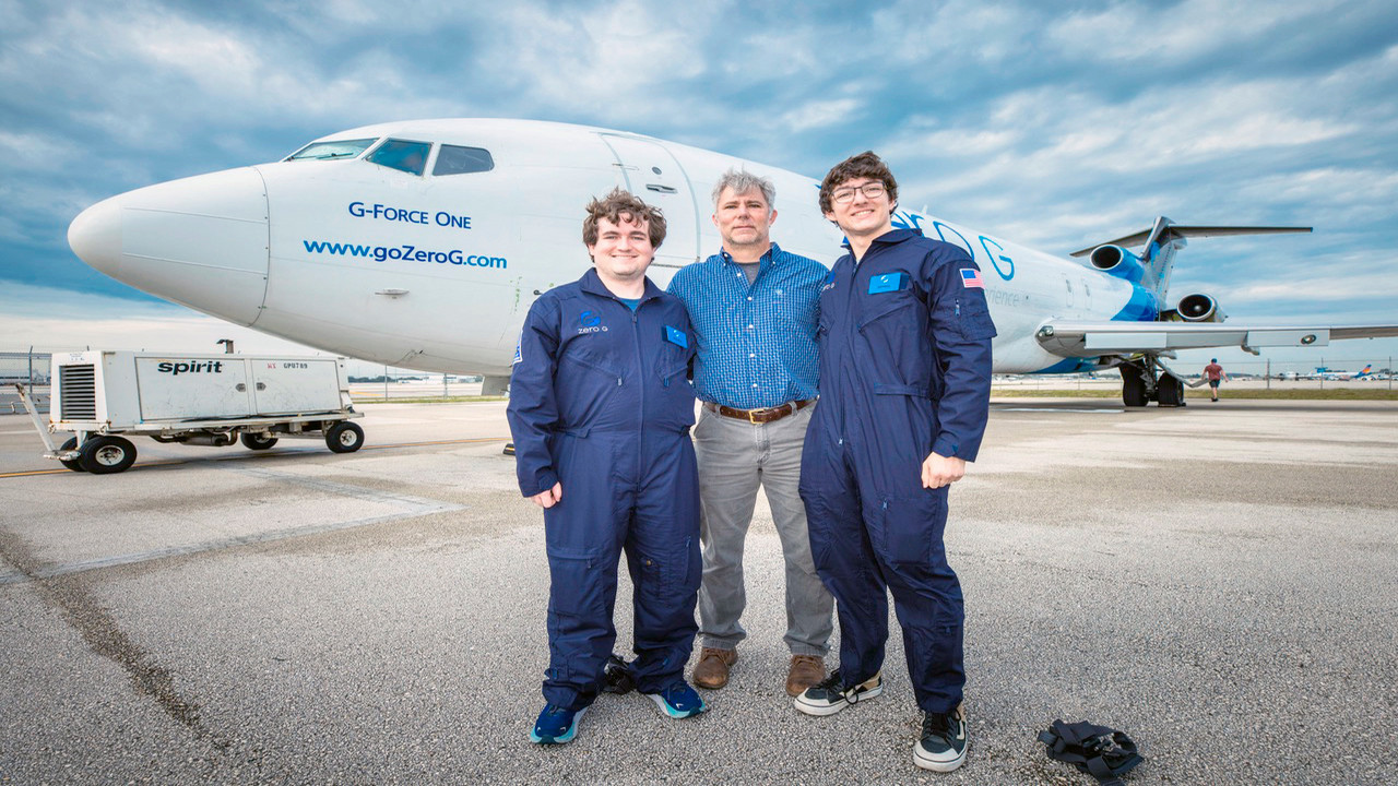 David Scarborough, an associate professor in the Department of Aerospace Engineering at Auburn University (middle) stands with graduate students Daniel Stubbs (left) and Trevor Crane (right). 